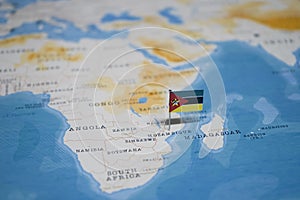 The Flag of mozambique in the world map photo