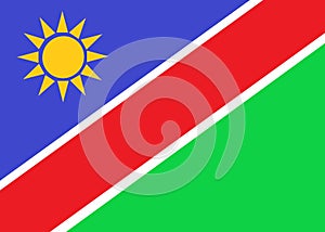 The flag of Namibia with diagonal bands of indigo blue white red green and a twelve pointed yellow star