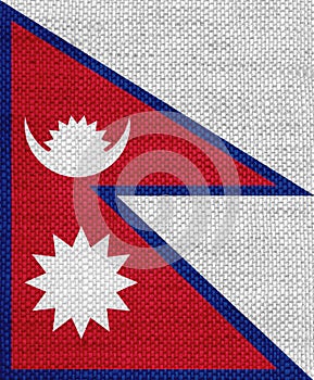 Flag of Nepal on old linen
