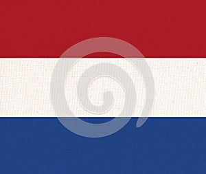 Flag of Netherlands. Holland state symbol. flag on fabric surface