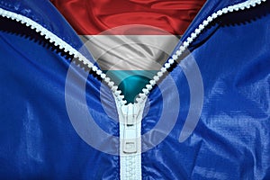Flag of the Netherlands under unpacked zipper