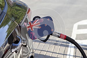 Flag of New Zealand on the car`s fuel filler flap.