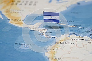 The Flag of nicaragua in the world map photo