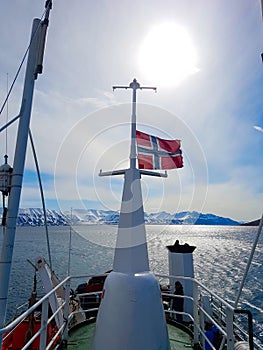 Flag of norway on Expedition on ship and boat in Svalbard norway landscape ice nature of the glacier mountains of Spitsbergen