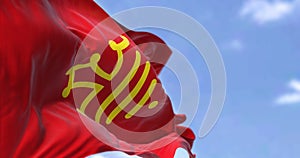 The flag of Occitanie region waving in the wind on a clear day