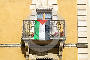 The flag of Palestina on balcony