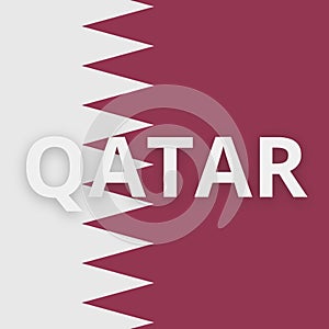 Flag of Qatar with the text Qatar in the middle photo