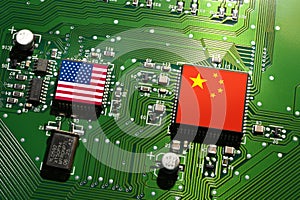 Flag of the Republic of China and the United States on microchips of a printed electronic board.