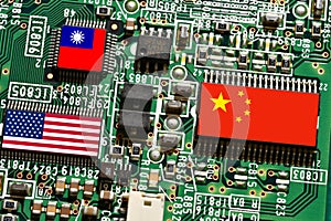 Flag of the Republic of China, United States and Taiwan on microchips of a printed electronic board. Concept for world supremacy