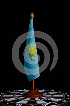 Flag Republic Kazakhstan on board game darts.Concept is under gun, crisis of the state