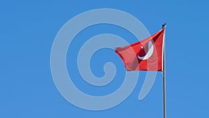 Flag of Republic of Turkey swings in wind