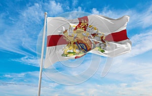 flag of Royal Arms of England at cloudy sky background on sunset, panoramic view. united kingdom of great Britain, England. copy