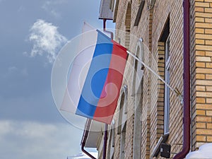 Flag of Russia on the building in close up