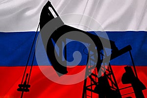 Flag of Russia near the oil rigs. Concept - news from Russia led to higher prices. URALS. Increase in oil production