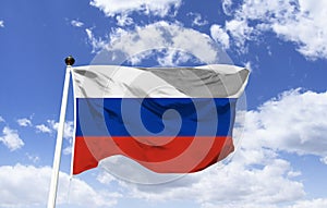 Flag of Russia, trembling under a blue sky