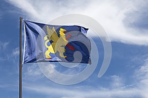 Flag of Saint Brieuc waving in mid air photo