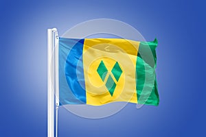 Flag of Saint Vincent and the Grenadines flying photo