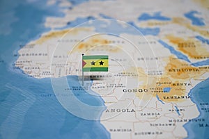 The Flag of sao tome and principe in the world map photo