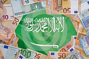 Flag Saudi arabia on the Euro banknotes background