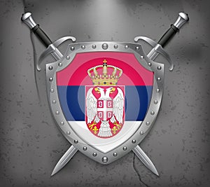 Flag of Serbia. The Shield with National Flag. Two Crossed Sword photo