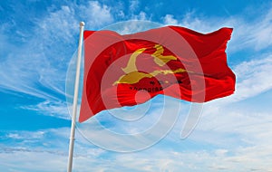 flag of SHANGRAO at cloudy sky background on sunset, panoramic view. People\'s Republic of China. copy space for wide banner