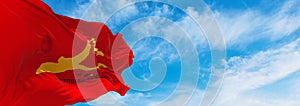 flag of SHANGRAO at cloudy sky background on sunset, panoramic view. People\'s Republic of China. copy space for wide banner