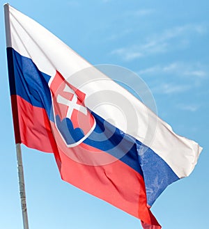 Flag of Slovakia against the blue sky