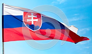 Flag of Slovakia against the blue sky