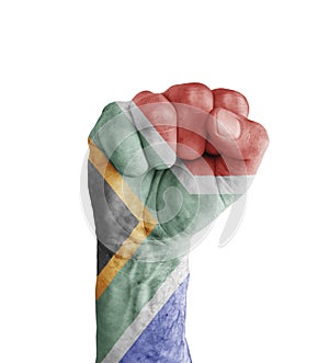 Flag of South Africa painted on human fist like victory symbol