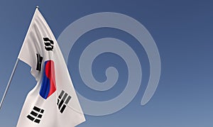 Flag of South Korea flagpole on blue background. Place for text. The flag is unfurling in wind. Korean, Seoul. Asia. 3D