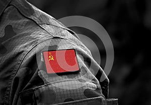 Flag of the Soviet Union on military uniform. The State Flag of the Union of Soviet Socialist Republics. Cold war. Collage