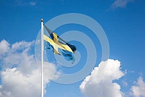 Flag of Sweden, cloudy sky
