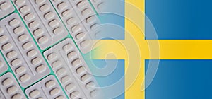 Flag of the Sweden with tablets. Pharmacology, developments in the field of pharmaceuticals, medicines, antibiotics, painkillers