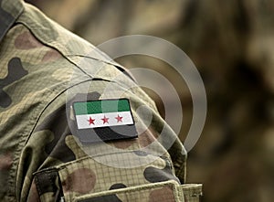 Flag of Syrian National Coalition on military uniform collage