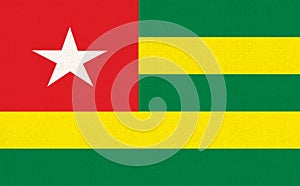 Flag of Togo. Tongolese flag on fabric surface. Togolese Republic