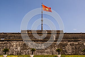 The Flag Tower with Vietnamese flag Nguyen Dynasty part of the citadel in Hue, the ancient capital of Vietnam