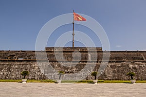 The Flag Tower with Vietnamese flag Nguyen Dynasty part of the citadel in Hue, the ancient capital of Vietnam