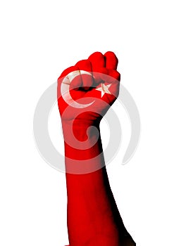 Flag of Turkey painted on a human raised fist- the concept of power and strength