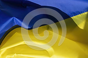 The flag of Ukraine is a banner of two equally sized horizontal bands of blue and yellow