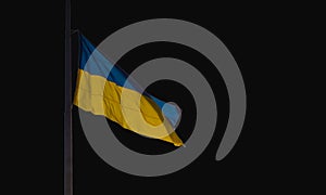 The Flag of Ukraine is a Large National Symbol Isolated on a Black Background. Large Yellow-blue State Flag of Ukraine,