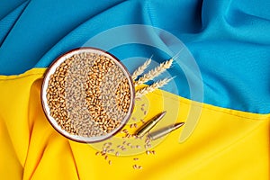 flag of Ukraine with wheat spikelets. Stop the war. Concept of food supply crisis and global food scarcity. place for text, top