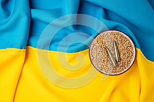 flag of Ukraine with wheat spikelets. Stop the war. Concept of food supply crisis and global food scarcity. place for text, top