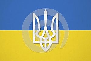 Flag of ukrainend and shield on colored cardboard