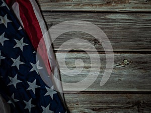 The  Flag of  United States of America  on natural wood table image for American freedom and Independence or Background with copy