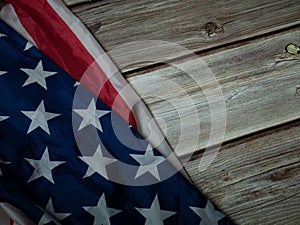 The  Flag of  United States of America  on natural wood table image for American freedom and Independence or Background with copy