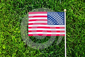 Flag of the United States. Green grass background. Celebration concept, Memorial Day, 4th of July , USA Independence Day