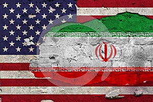 Flag of United states and Iran painted on the wall.