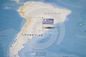 The Flag of uruguay in the world map photo