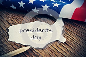 The flag of the US and the text presidents day, vignetted
