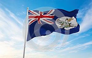 flag of Vancouver Island , Canada at cloudy sky background on sunset, panoramic view. Canadian travel and patriot concept. copy